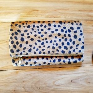 Animal print faux fur clutch